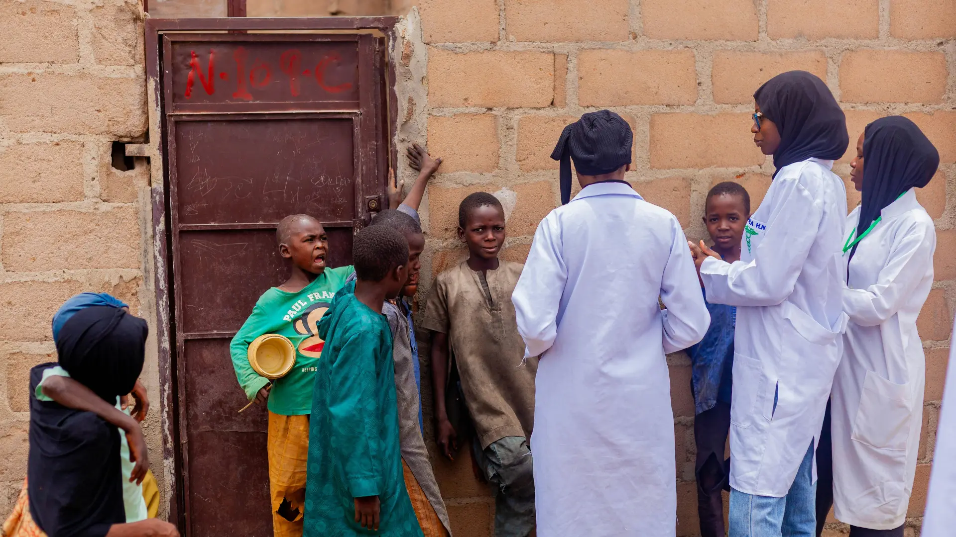 Health workers attending to residents at a CitiTap Foundation outreach clinic